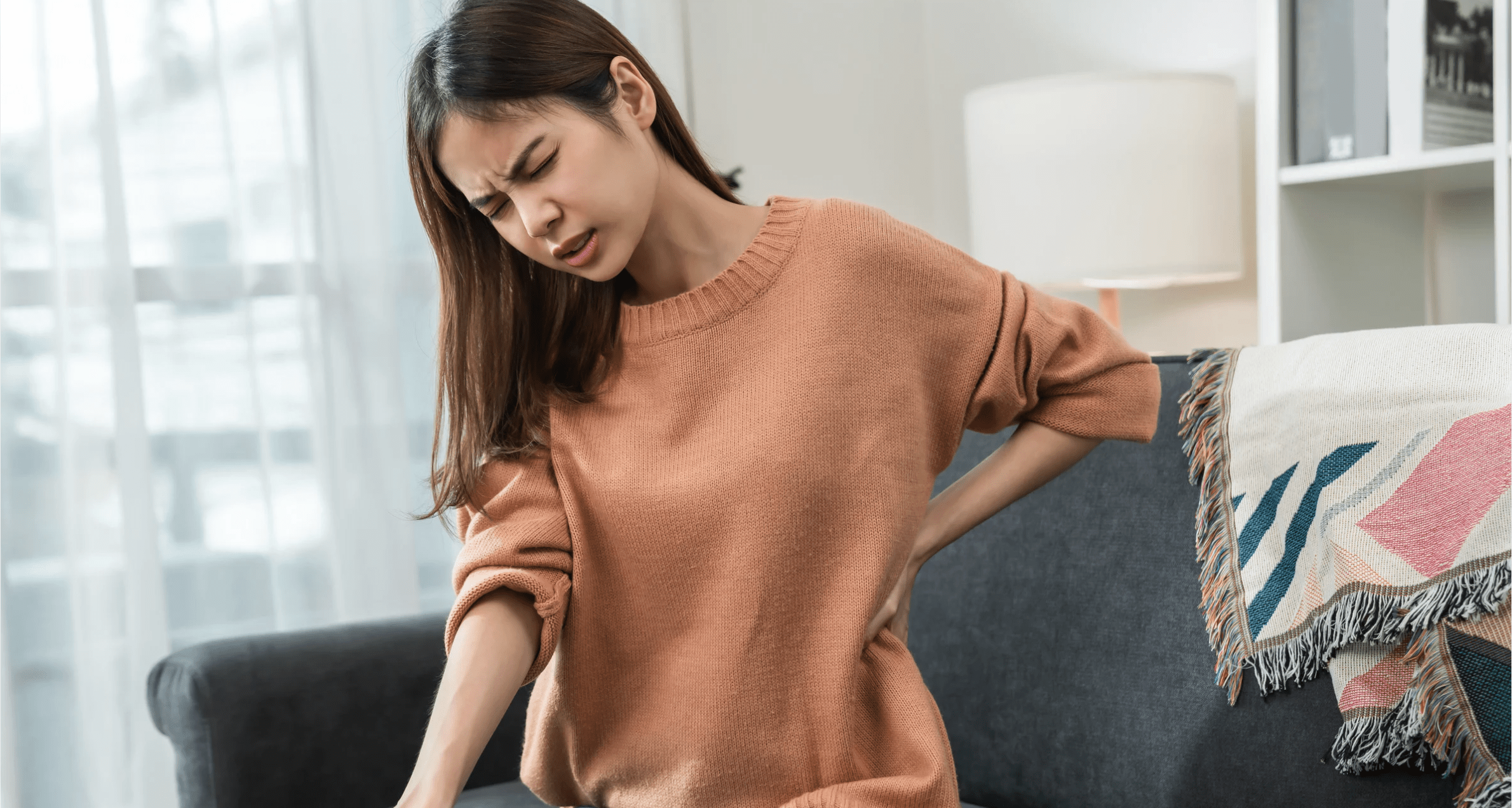 Women feeling pain from trauma stored in the body